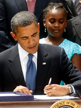 Obama signs the bill